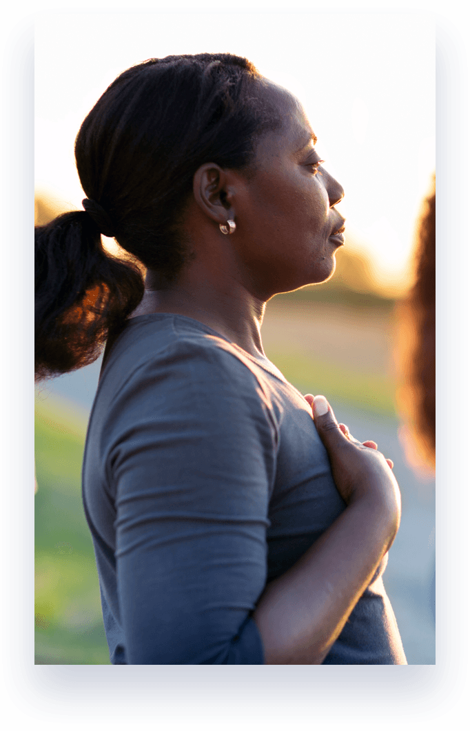 woman meditating outside